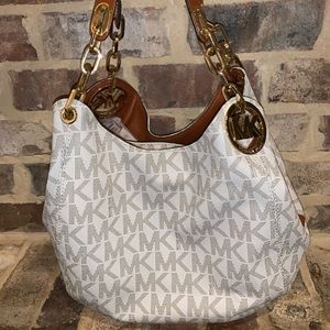 MK white monogram purse.